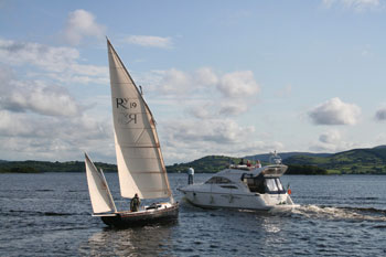 Romilly under sail meets motor cruiser under idiot