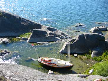 Romilly moored in a Baltic cove